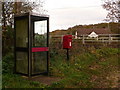 Stuckton: postbox № SP6 206 and phone box