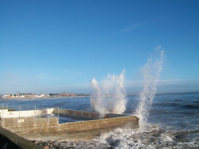 Waves breaking against the walls of the Rock Pool Baths