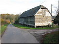 Large wooden building at Cross Oaks Farm