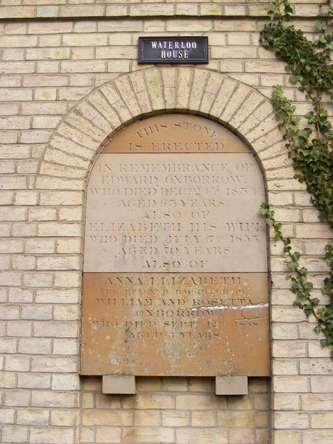 Plaque on the wall of Waterloo House, Deben Court
