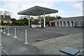R2558 : Petrol station at Killadysert by Graham Horn