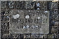 A plaque on Buckland bridge on the river Caen