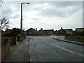 Looking from Sandown Avenue into Alinora Crescent