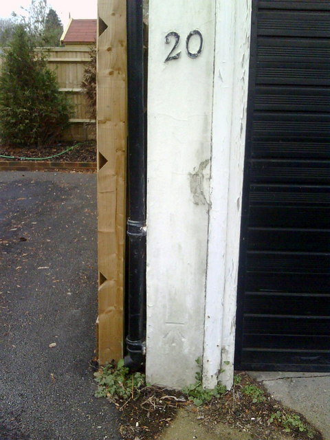 Benchmark on garage of #20 Braywick Road