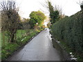 Looking E along Green Lane towards crossroads