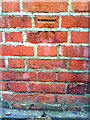 Benchmark on wall outside St Josephs Parish Centre, Cookham Road