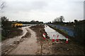 Flood alleviation works continue on a rainy day