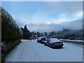 Approaching the junction of a snowy Portsdown Hill Road and Pennant Hills