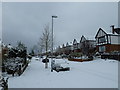 Houses in a snowy Grant Road