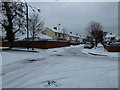 Crossroads of a snowy  Central Road and South Road