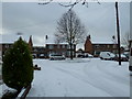 Turning circle at the bottom of a snowy Lealand Road