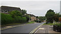 Approaching the junction of Wissett Road and Mill Hill Drive