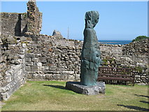 NU1241 : Statue of St Cuthbert on Holy Island by David Purchase