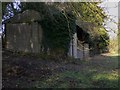 Outbuildings by footpath near Binsted