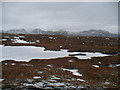 NH2087 : Snow and ice covered hill lochan by Andrew Spenceley