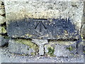 Benchmark on cemetery wall pier at junction of Cornwall Road and Longcroft Road