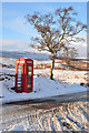 Old style telephone box at the road junction at Syre