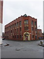 Building on the corner of Cottenham Lane and Sherborne Street West, Manchester