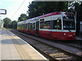 Tram at Merton Park station