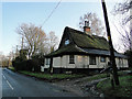 Thatched cottage at Linstead Parva