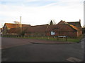 Barns at the junction of Hilltop Gardens and West View