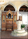 TF9439 : All Saints' church in Wighton - the church organ by Evelyn Simak