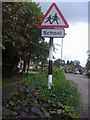 Old pole with new sign, Wolmer Gardens