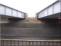 TQ4078 : Railway bridges over Bugsby's Way by Gareth James