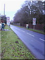 Traffic calming signs at entrance to village on Ladder Hill