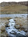 Icy Wildscar Sike debouches into the Tees below Cronkley Scar