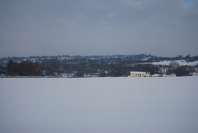 A large snow covered field south of Stoke Hammond