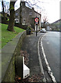 Milestone A6052 Denshaw Road, Delph