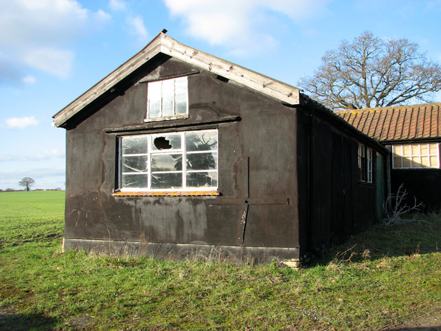 Tarred outbuilding by Overcross