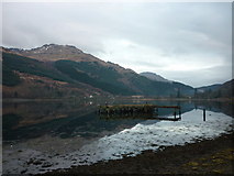 NN2904 : An old pier on Loch Long by Ian S