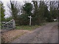 Footpath sign on Christmas Hill at the entrance to Little Tangley Nursery