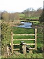 Stile gives access to a field by the River Yarty