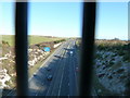 East along the A27 bypass through new safety fence