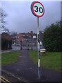 Road sign with stripy pole, Croft Avenue