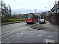 Supertram 124 on Middlewood Road approaches the junction of Leader Road