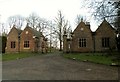 The lodges at the entrance to Coldham Hall