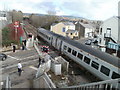 Arriva train passes through Pencoed station level crossing, Hendre Road