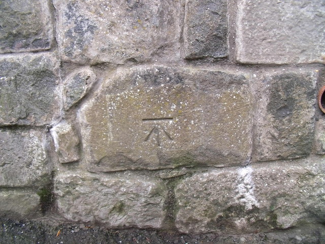 Benchmark on boundary wall of military school & barracks, Caernarfon