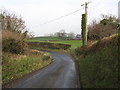 J2913 : Sharp bend near the upper end of the Derryoge Road by Eric Jones