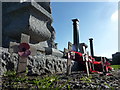 Wooden crosses at the base of the British Legion War Memorial