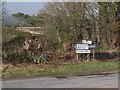 Direction signs and hydrant markers on the Lurganconary Road