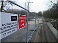 The road is closed at the bridge over the River Dove