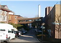 Sloping enclosed bridge connecting two halves of St Woolos Hospital