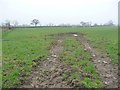 Muddy field entrance