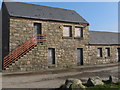 Temporarily boarded up buildings on the Annalong Marine Park site