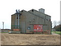 Grain dryer next to the dismantled railway